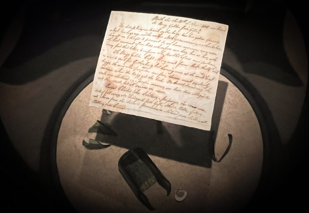 Ett brev funnet i en flaskpost från ett sjunkande skepp. I monter på Länsmuseet Gävleborg